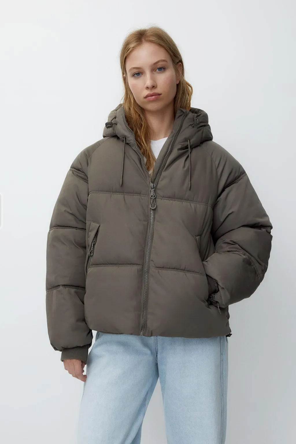 GEWATTEERD JACK MET CAPUCHON