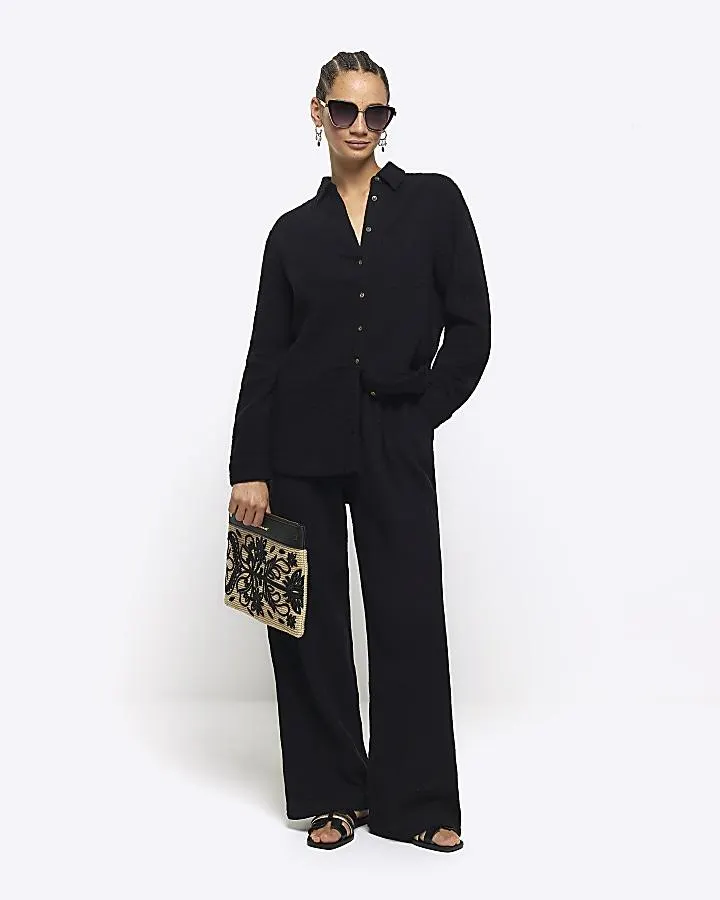 Black textured long sleeve shirt