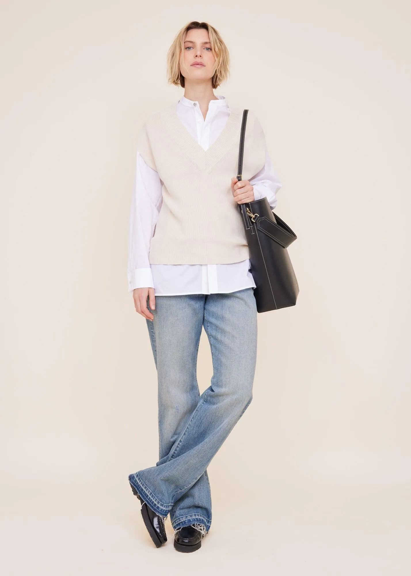 Gebreide spencer met v-hals