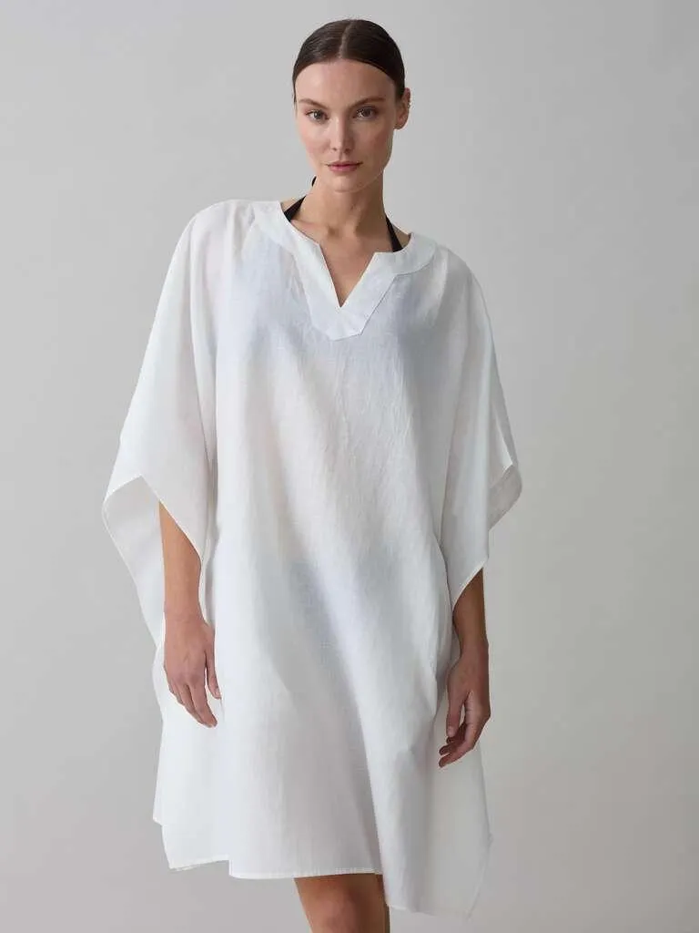 Optical White Beach cover-up poncho with pockets