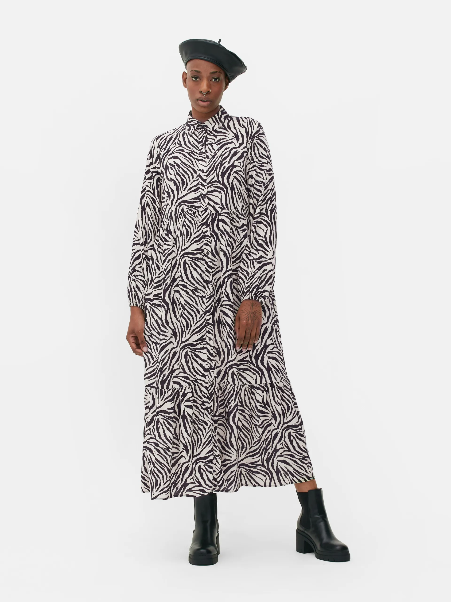 Smokjurk met knopen en lange mouwen