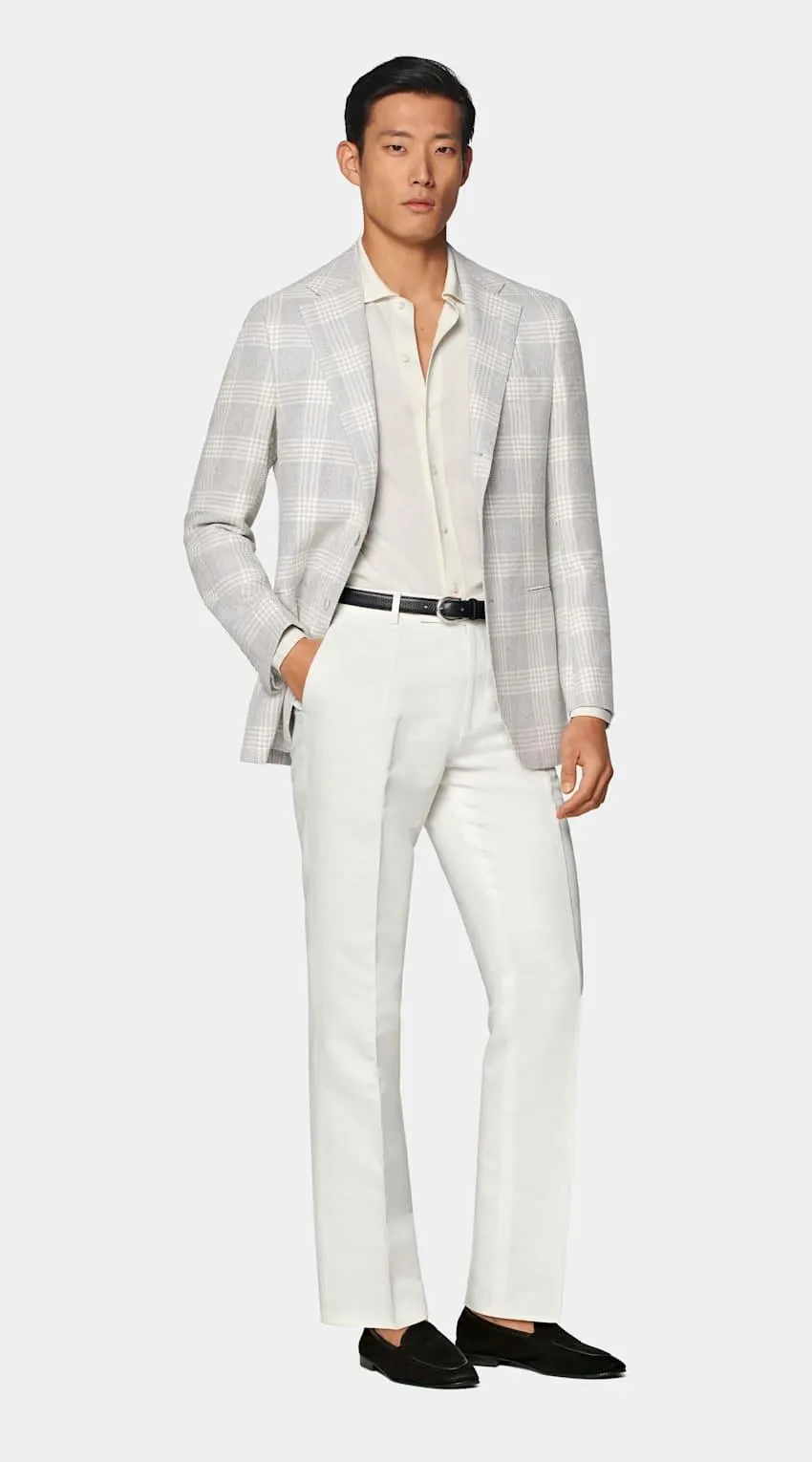 Tailored grey check blazer crafted with a notch lapel and jetted pockets for a contemporary feel, complemented by half-canvas construction.