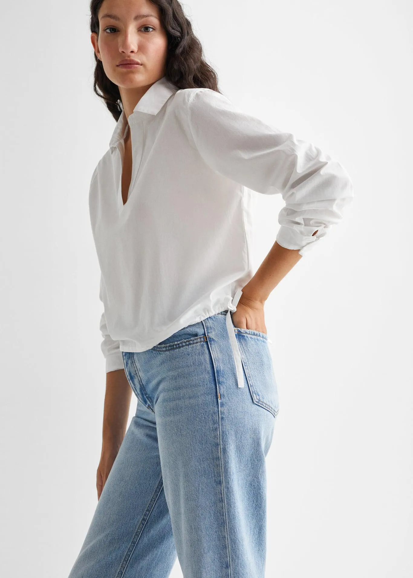 Soepelvallende blouse met strikken