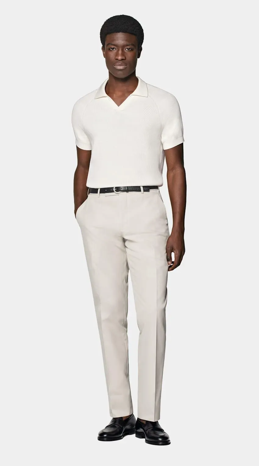 Whether it's on its own or under a blazer, this ribbed off-white buttonless polo gives any look an element of depth & texture while losing none of the classic versatility & comfort.