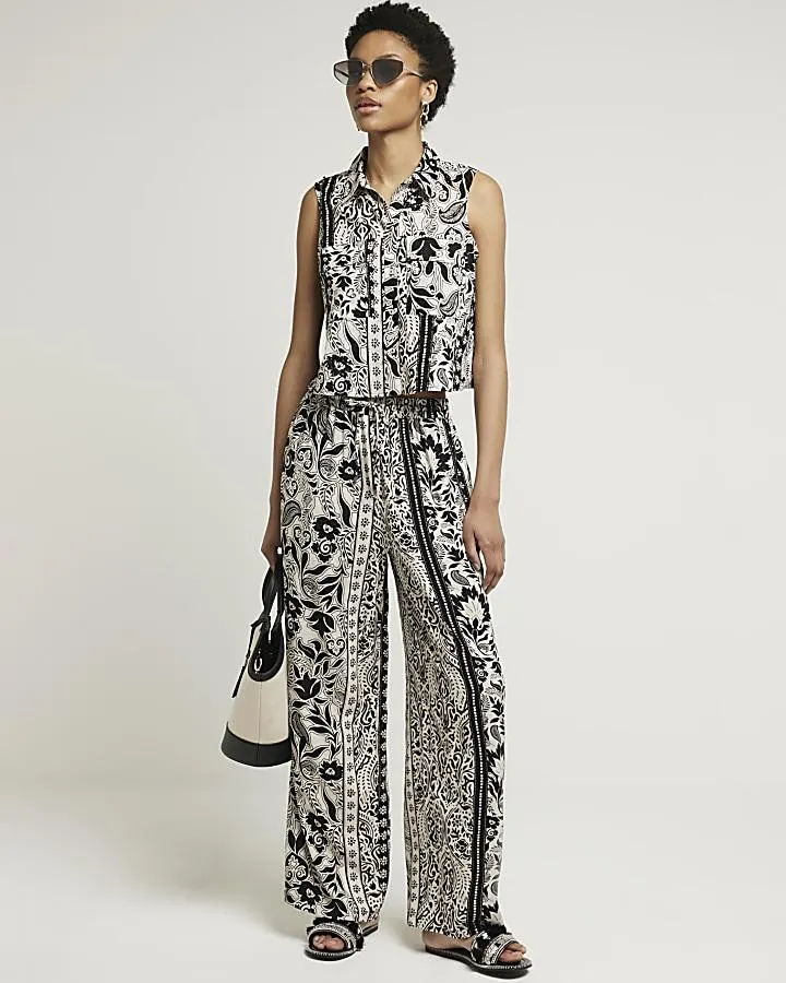 Black floral wide leg trousers