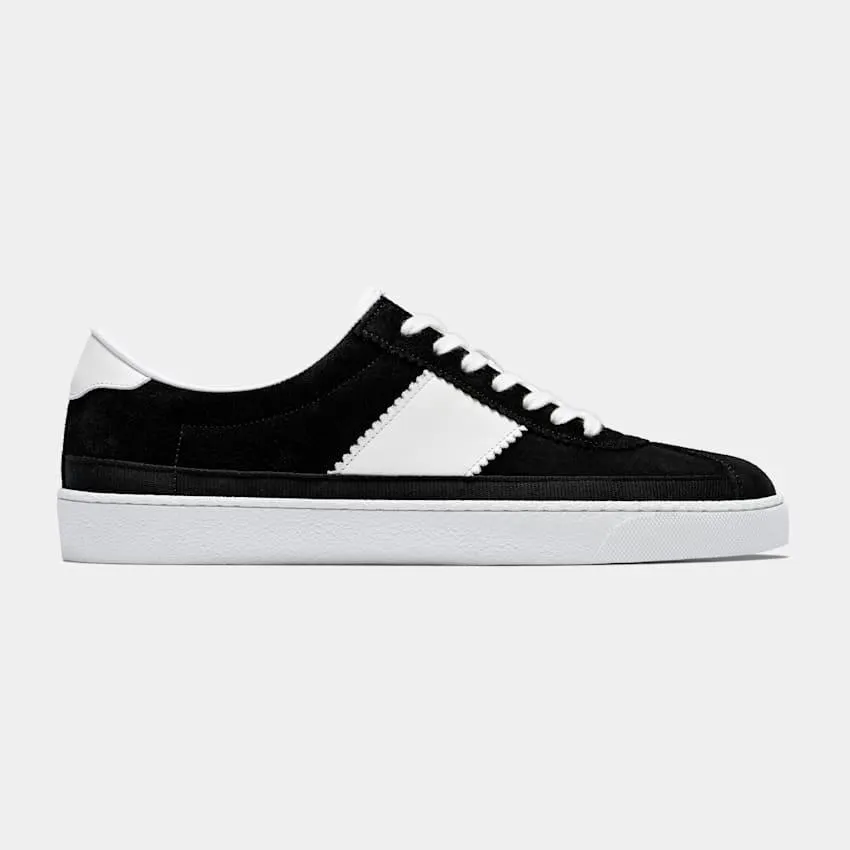 An elevated take on the casual sneaker, this black pair is crafted from Italian calf suede and features a white leather heel tab and design detail.