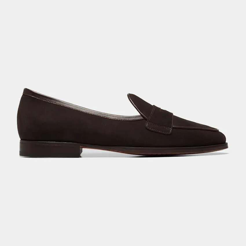 A standout pair that adds stylish elegance to any ensemble, these brown penny loafers are crafted in Portugal from Italian calf suede and feature a full leather interior and sole.