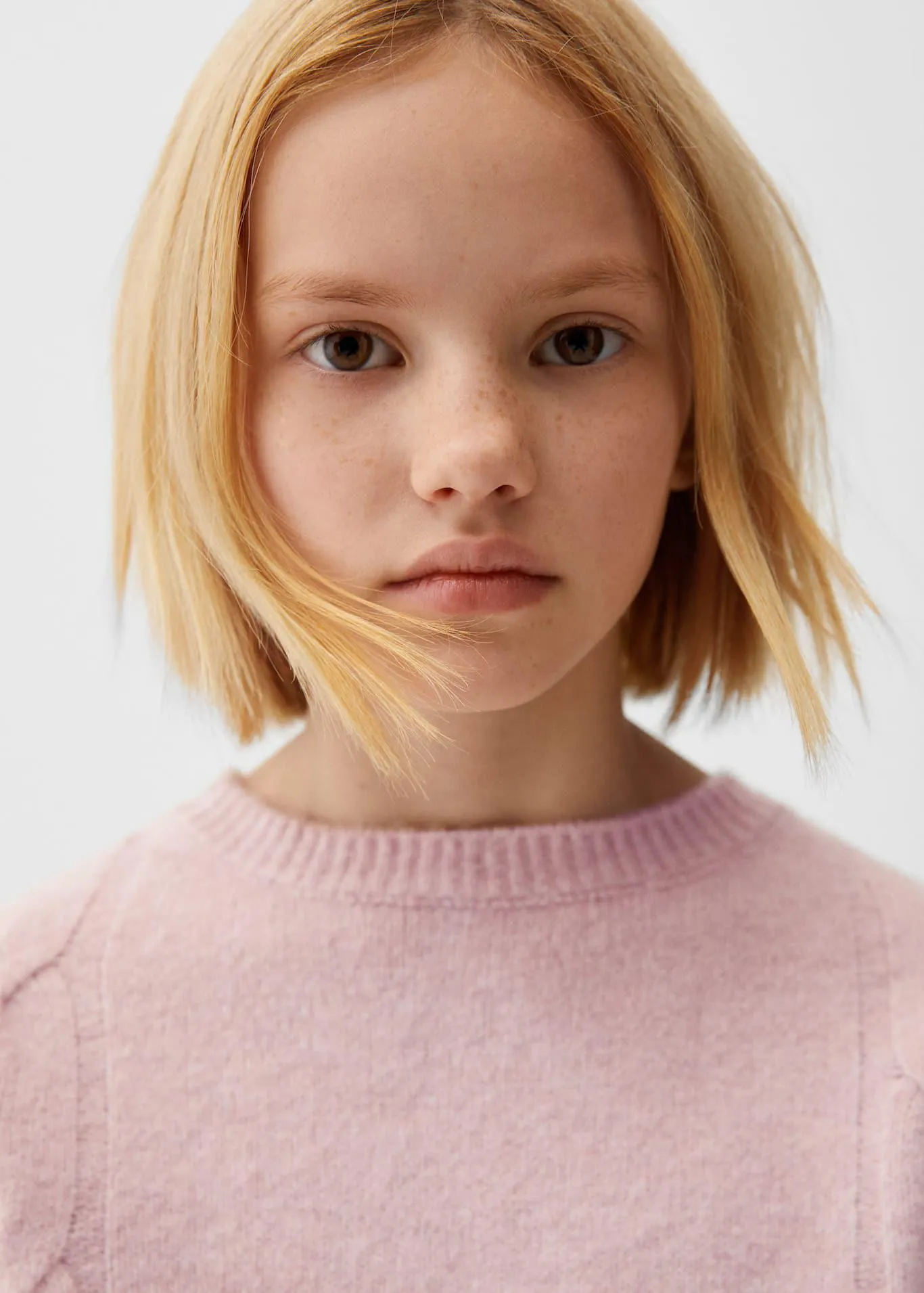 Gebreide trui met strik