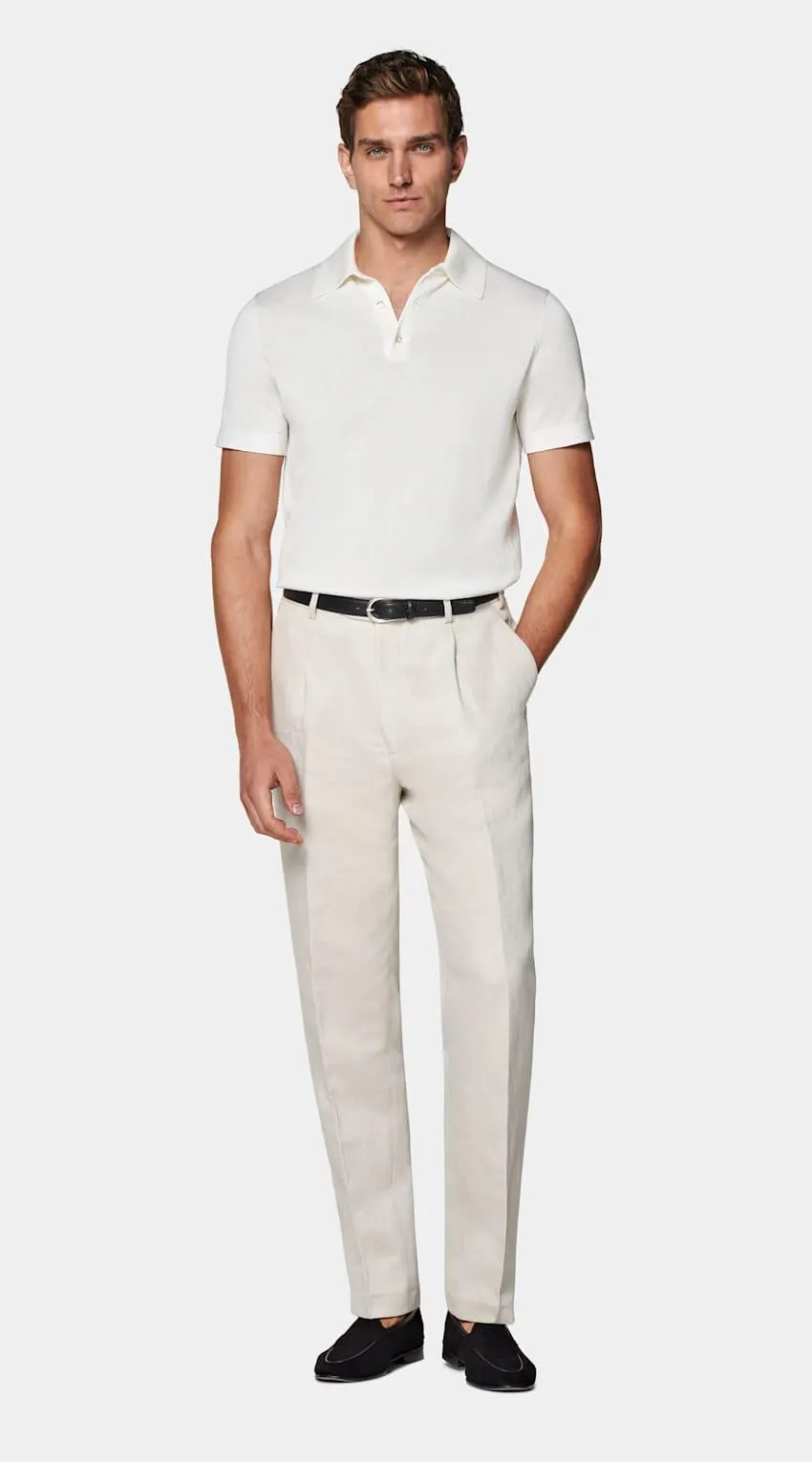 Casual refinement is effortless with this soft off-white polo. Tailored slim with mother of pearl buttons and textured ribbed trims, it's a perfect pick for a versatile, relaxed look.