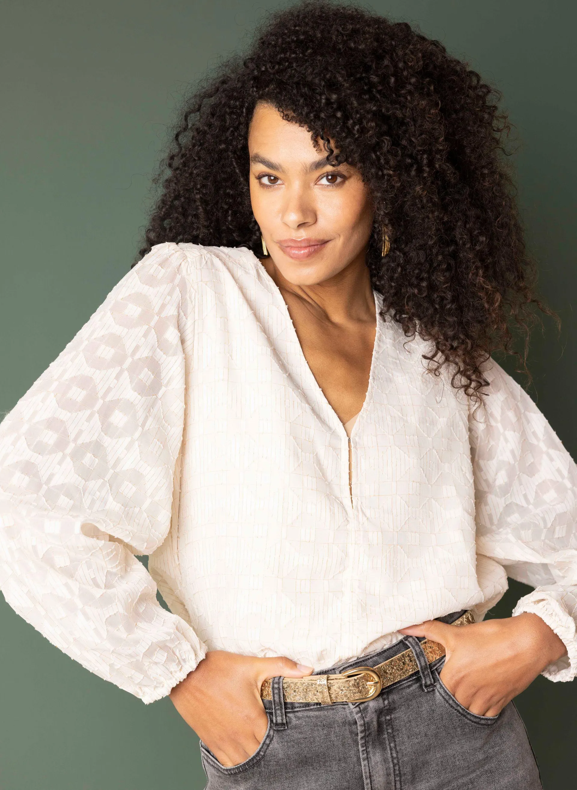 Champagnekleurige blouse met structuur