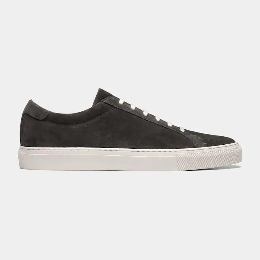 A versatile and classic black sneaker that brings casual style to any look, these calf leather kicks are made in Portugal with full light brown leather lining, white flat waxed laces, and rubber sole.