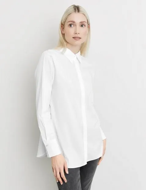Fijne katoenen blouse met plooien op de rug