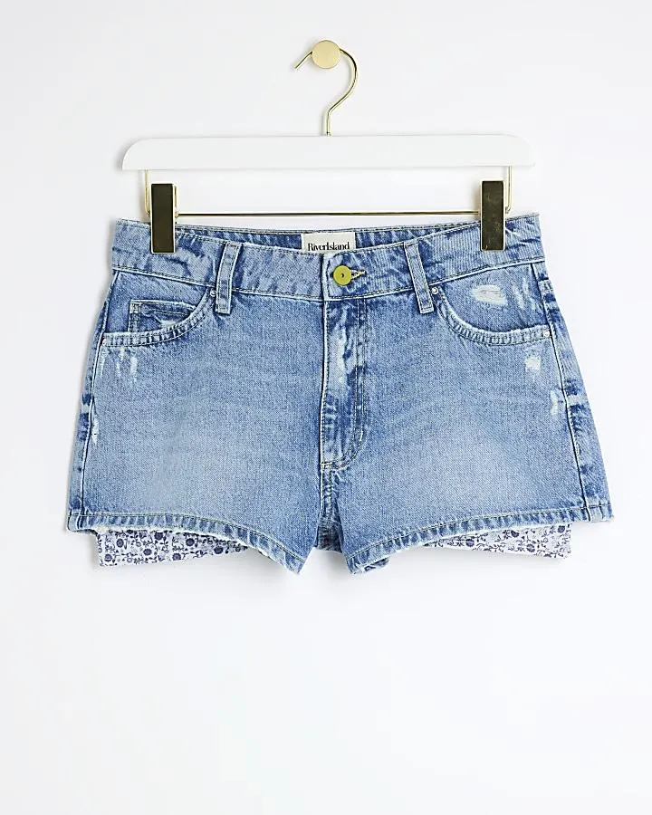 Blue mid rise ripped denim shorts