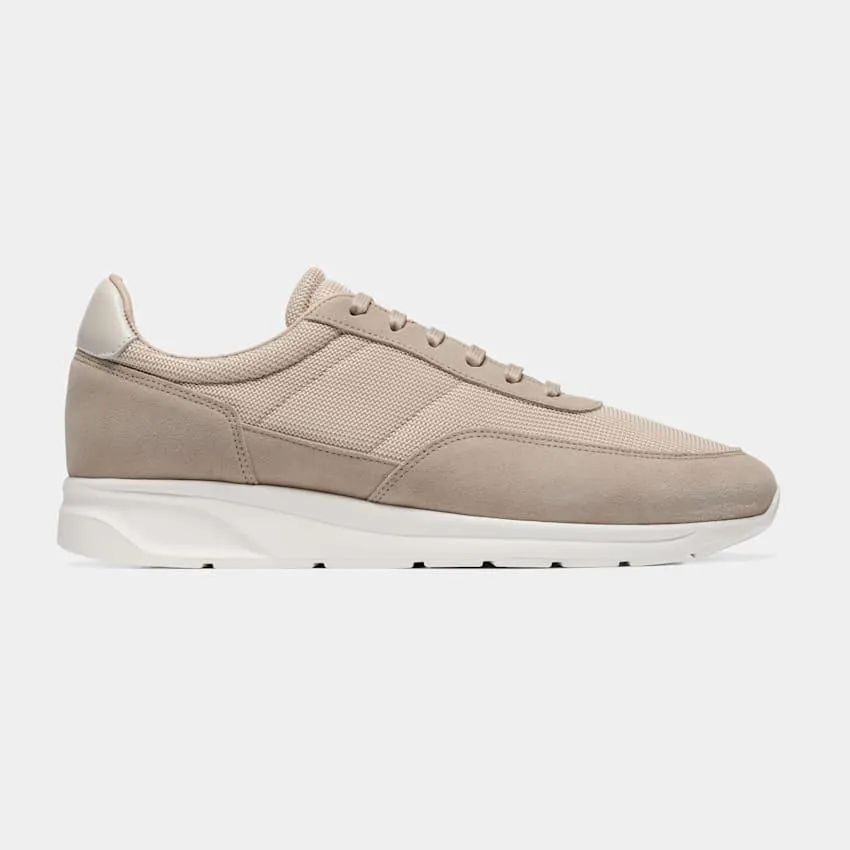 An up-to-date take on the classic running shoe, these breathable light brown suede & mesh sneakers feature a light brown leather interior and thick rubber sole for comfort & support.