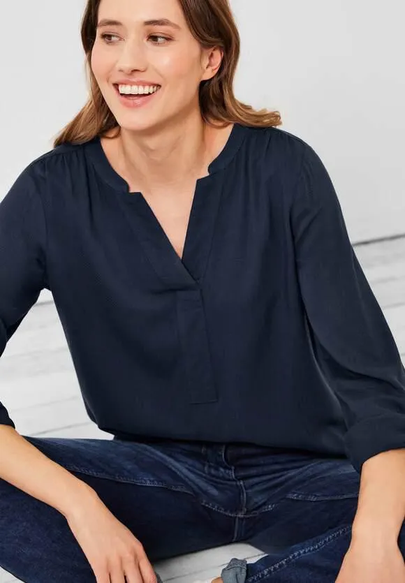 Lange blouse in effen kleur