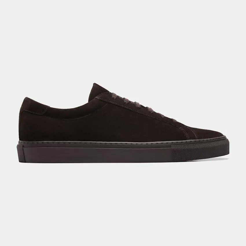 Crafted with a rubber sole and light brown leather interior, these dark brown Portuguese-made calf suede sneakers are perfect for a casual look any time of day.