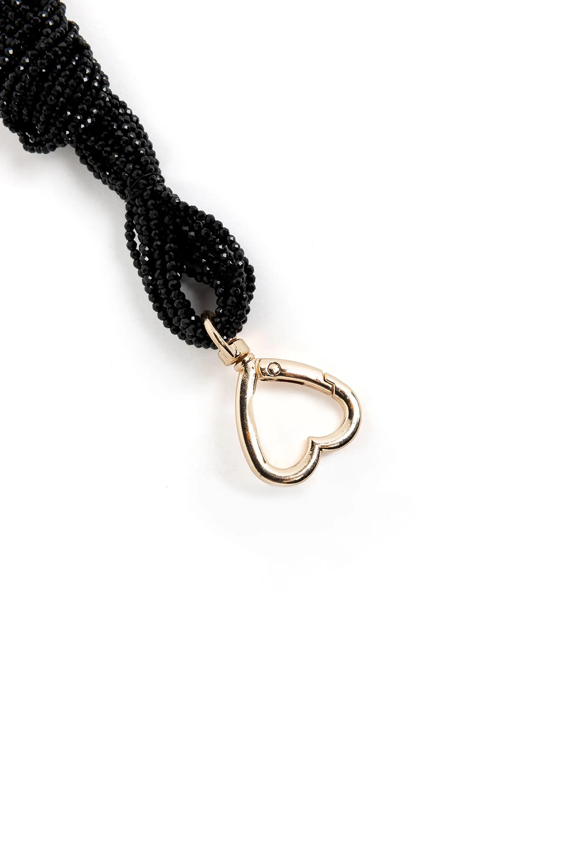 Zwarte sleutelhanger met kwast en hartje