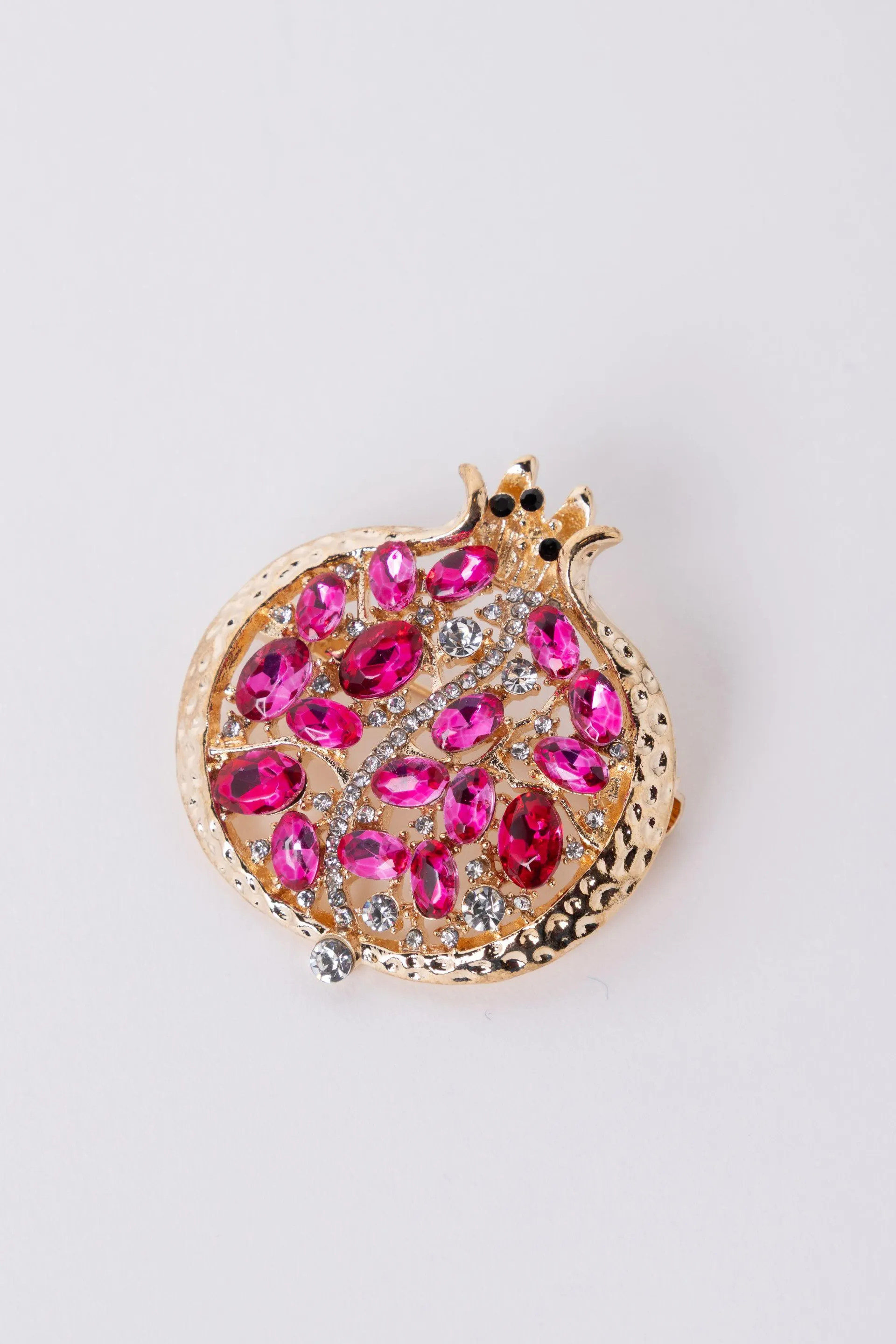 Goudkleurige broche granaatappel