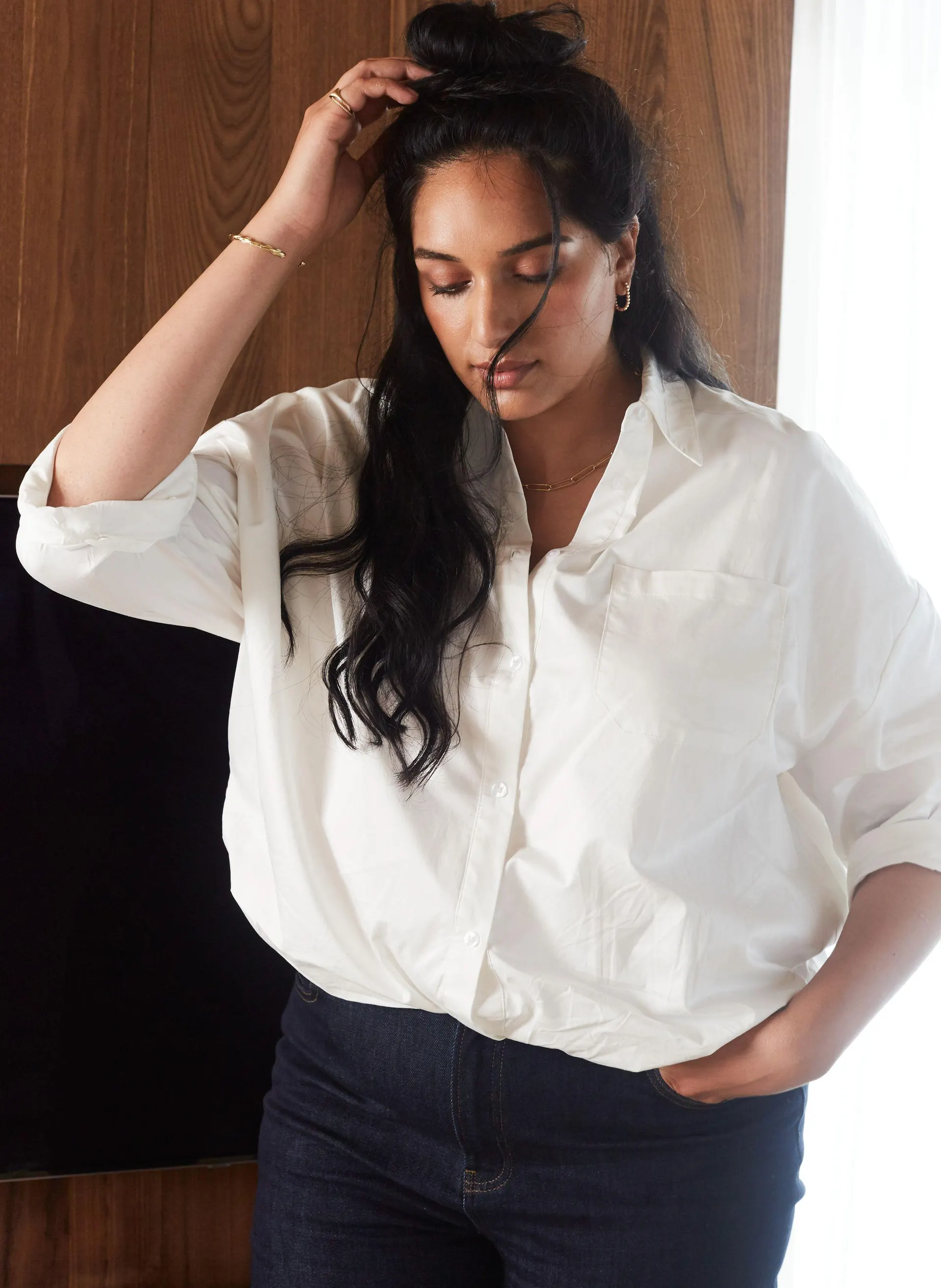 Off-white blouse met elastische band