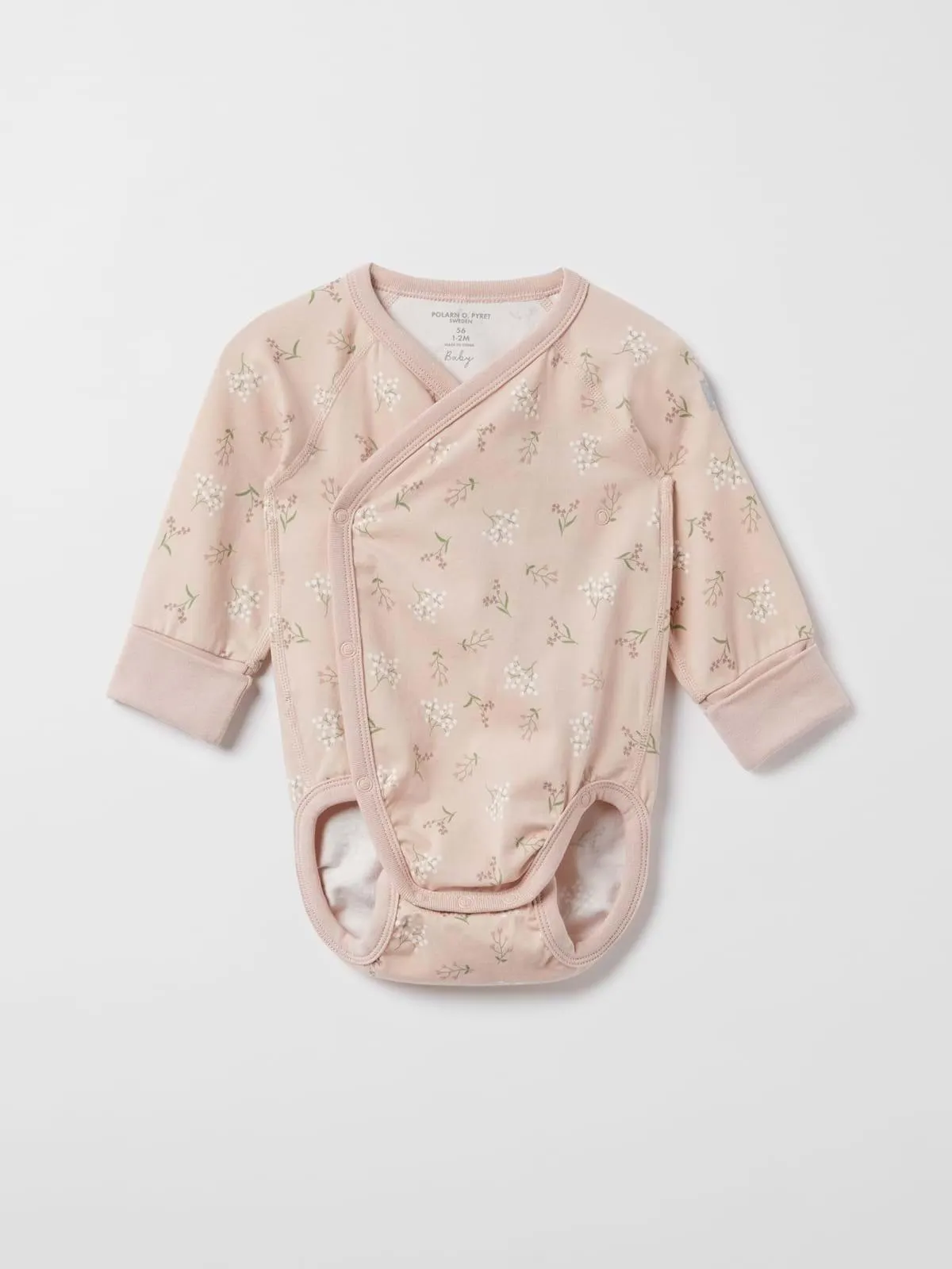 Forlengbar omslagsbody blomstret