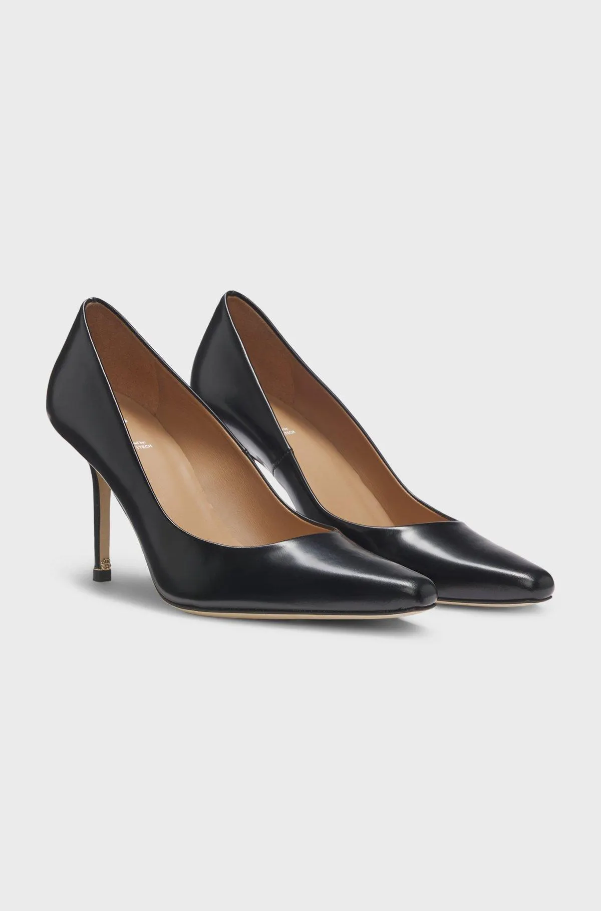 Pointed-toe pumps in polished leather