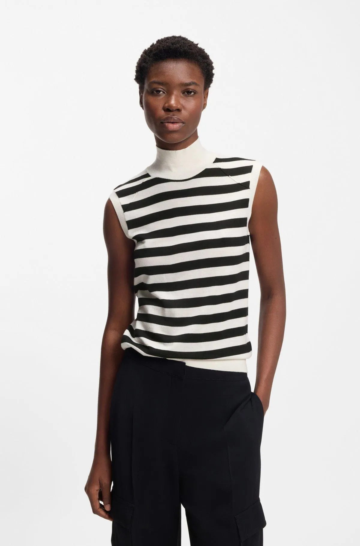 Sleeveless top in merino wool with mock neckline