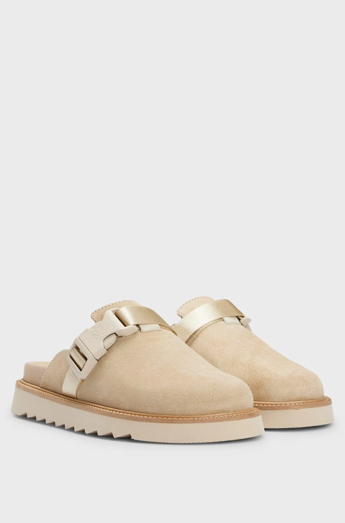Suede slip-on shoes with buckled strap