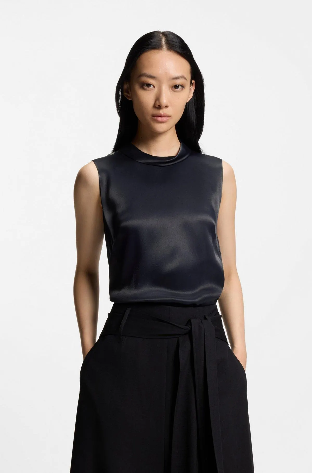 Sleeveless sateen top with keyhole rear closure