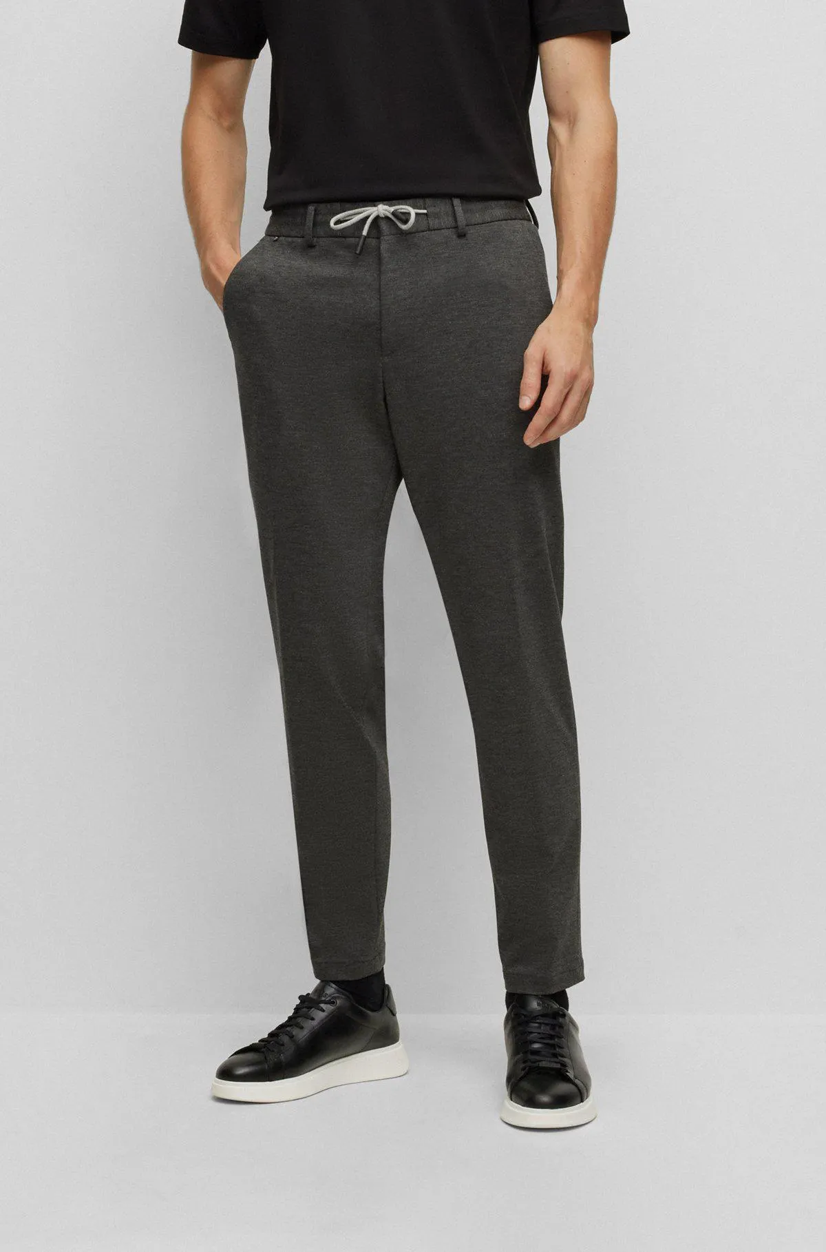 Slim-fit trousers in performance-stretch interlock jersey