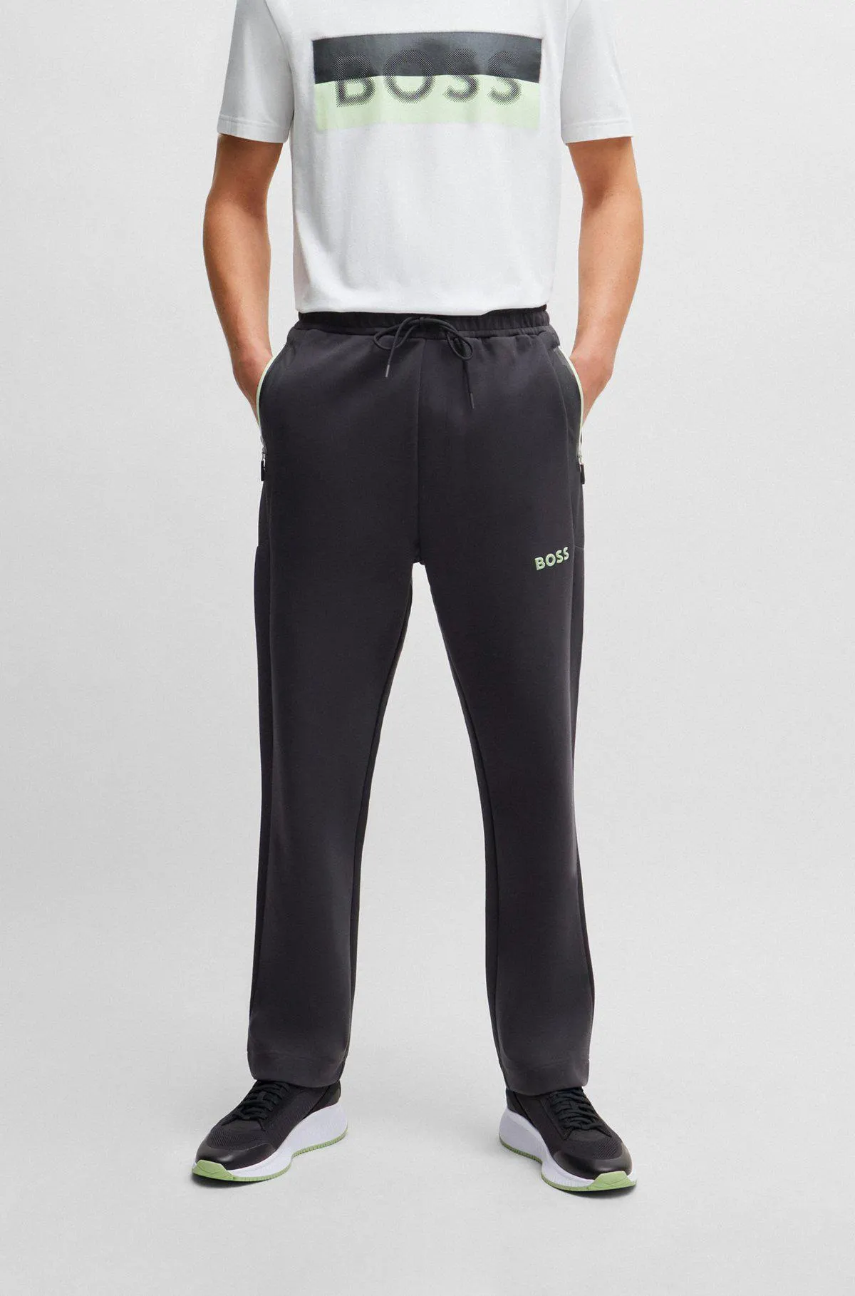 Open-hem tracksuit bottoms with 3D-moulded logo