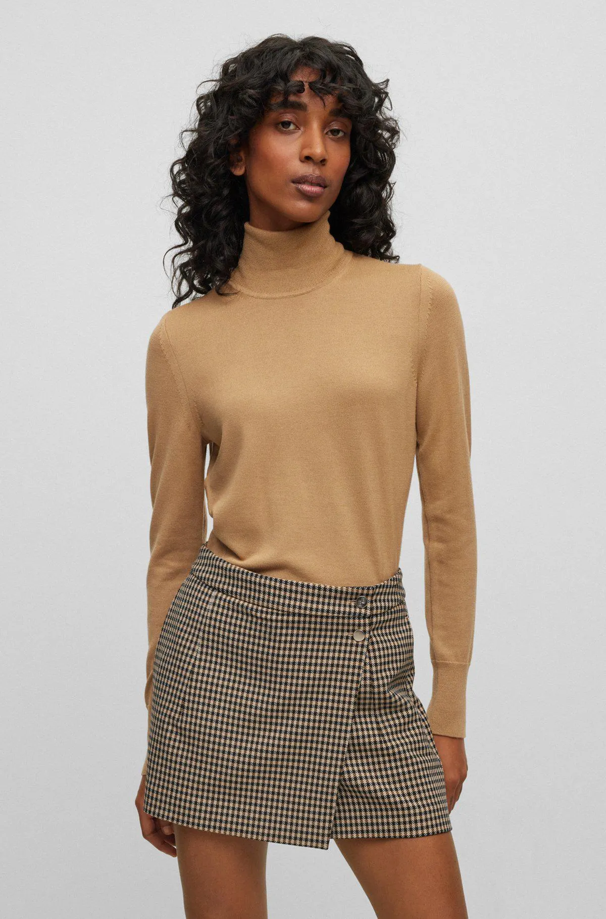 Rollneck sweater in virgin wool