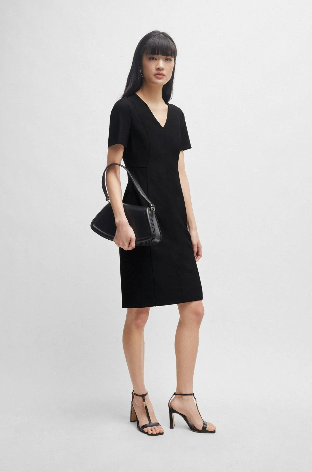 Vestido slim fit con cremallera que recorre toda la espalda