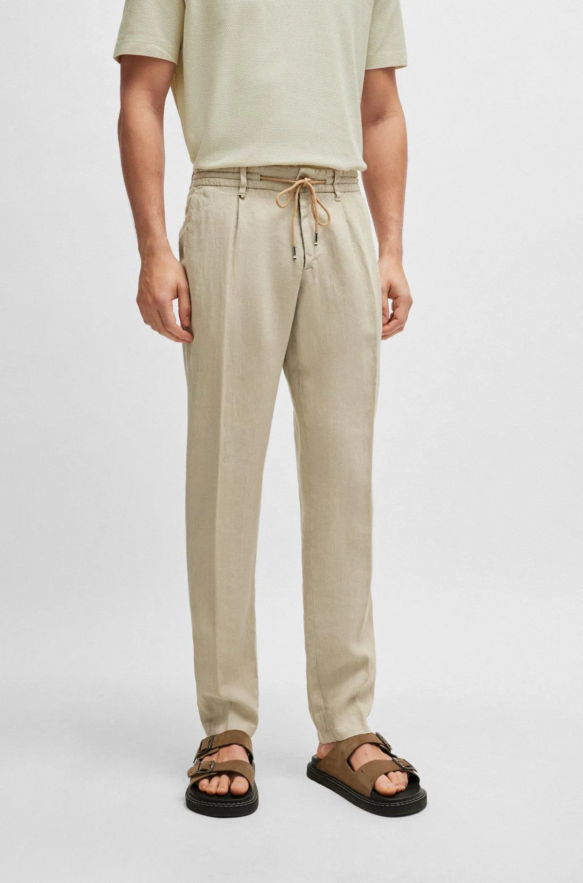 Slim-fit trousers in linen with tie waist