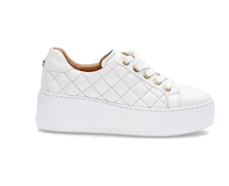 Feminin snøresko på plattform såle