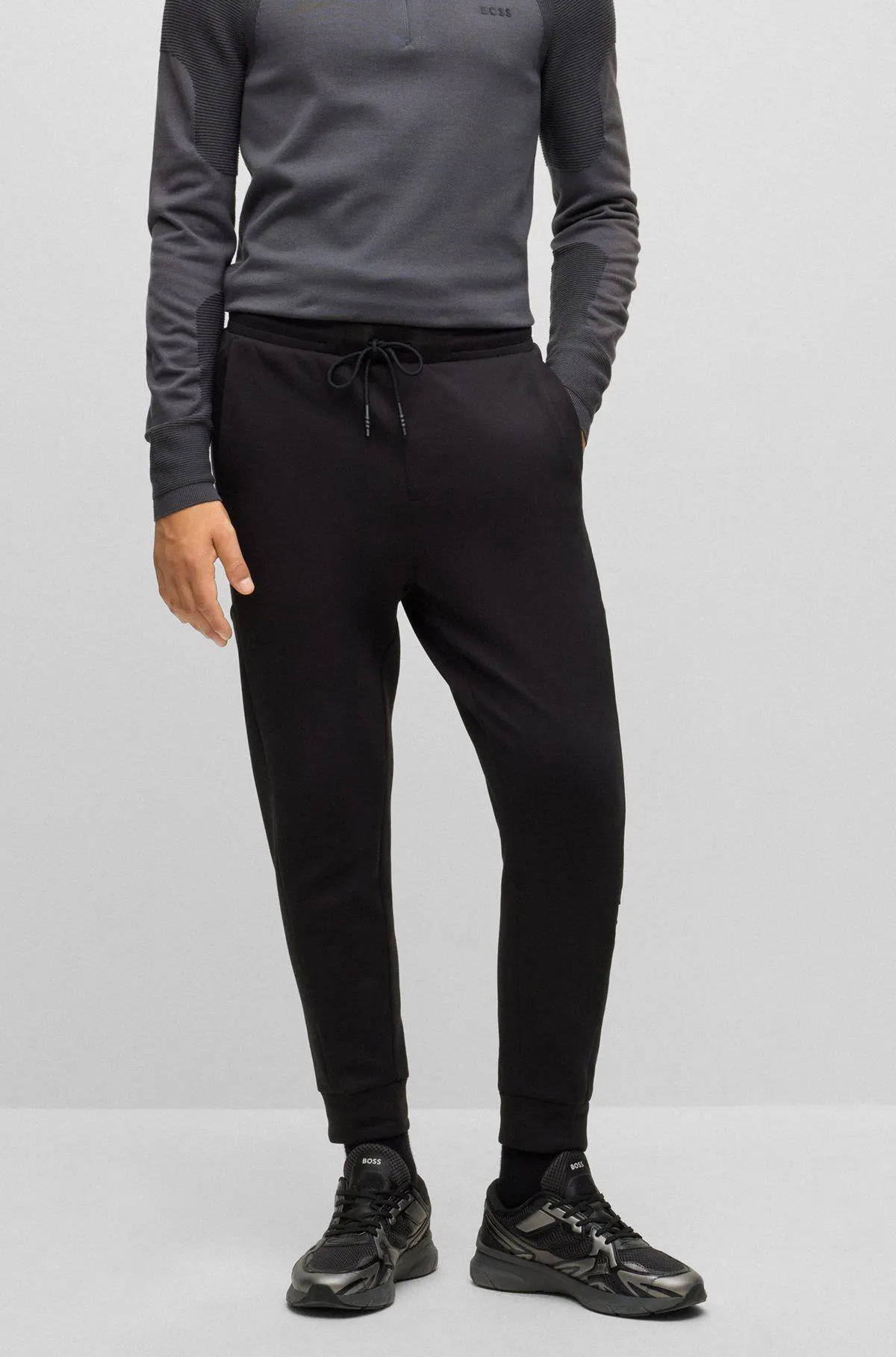 Cotton-blend tracksuit bottoms with embossed logo