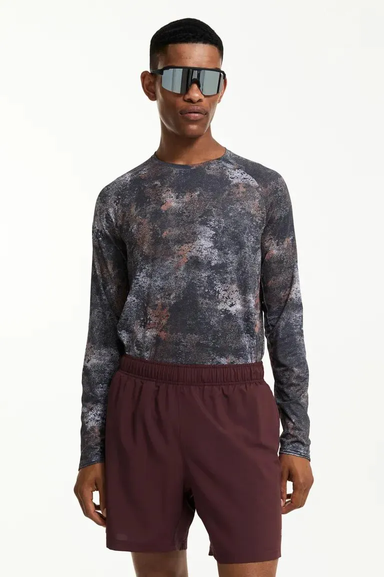 Treningsshorts i vevd DryMove™ med lommer