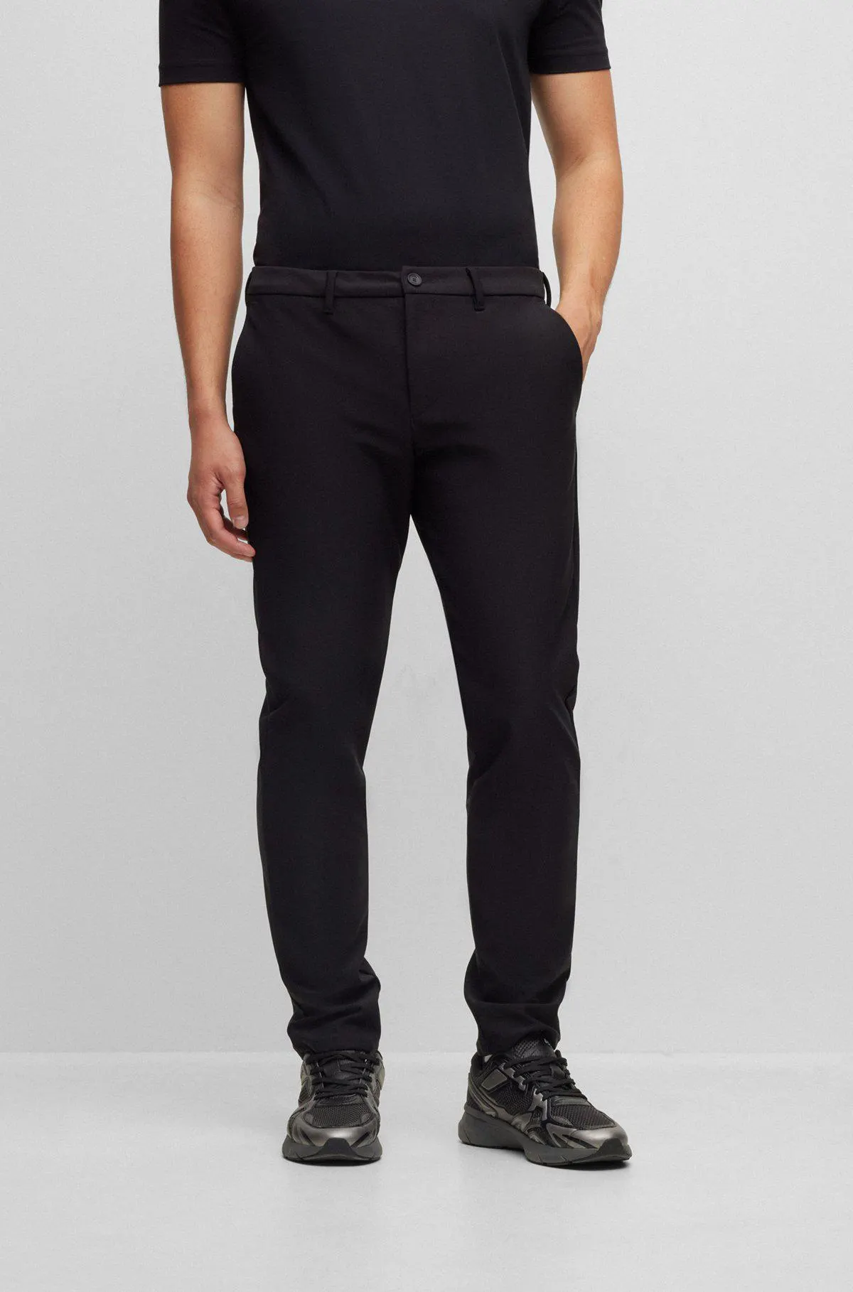 Slim-fit trousers in waterproof softshell material
