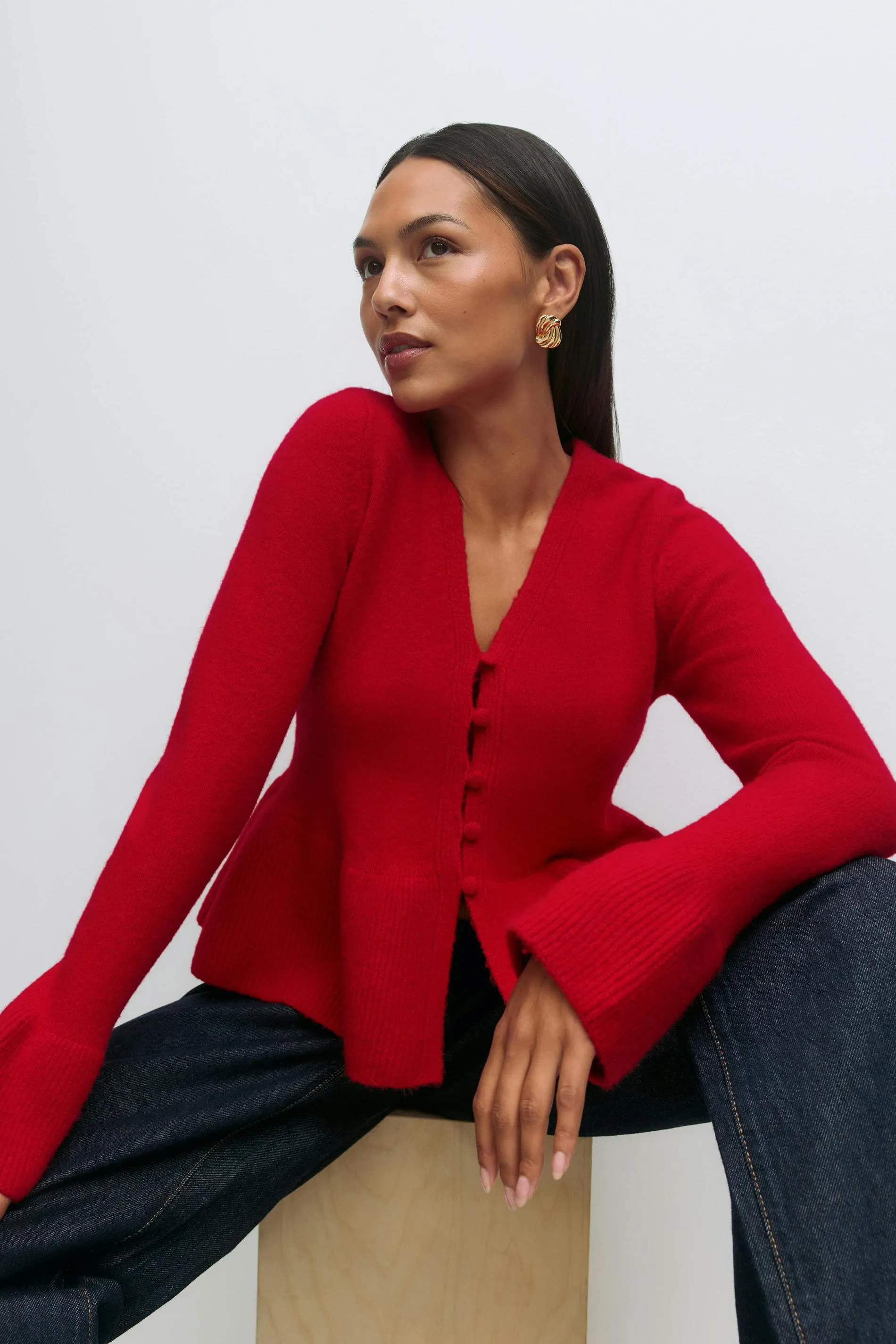 Knitted peplum cardigan