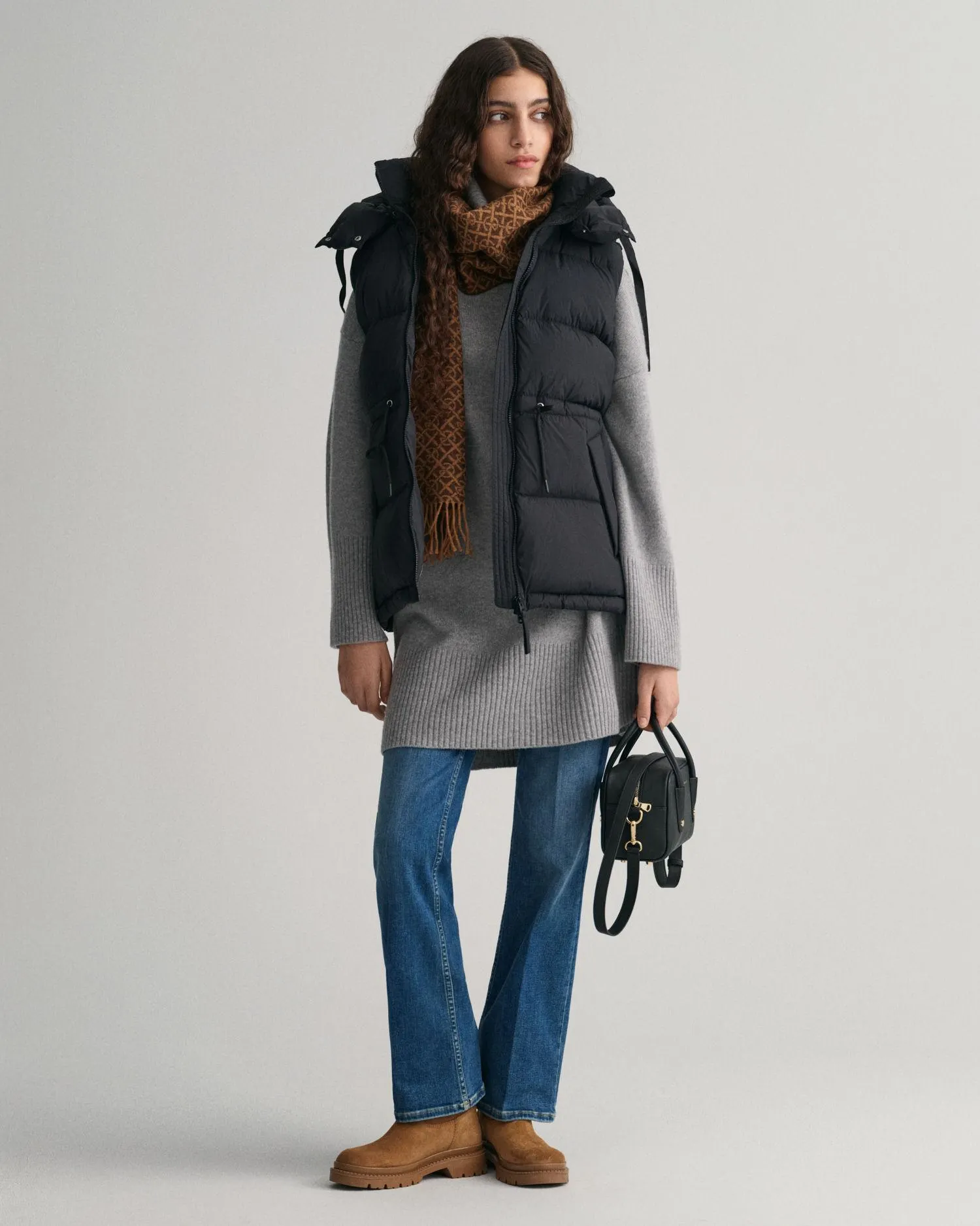 Dunvest med hette og snor i livet