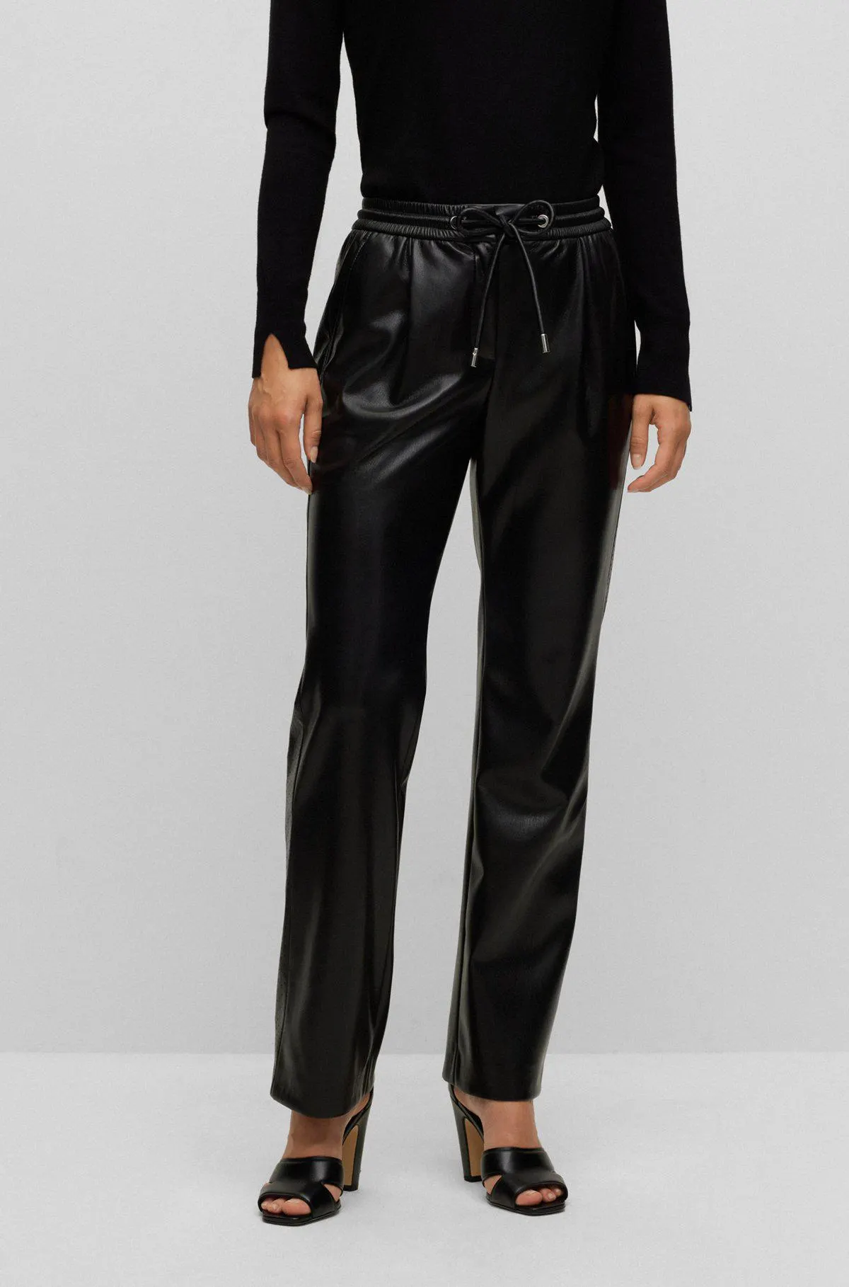 Relaxed-fit high-waisted trousers in coated material