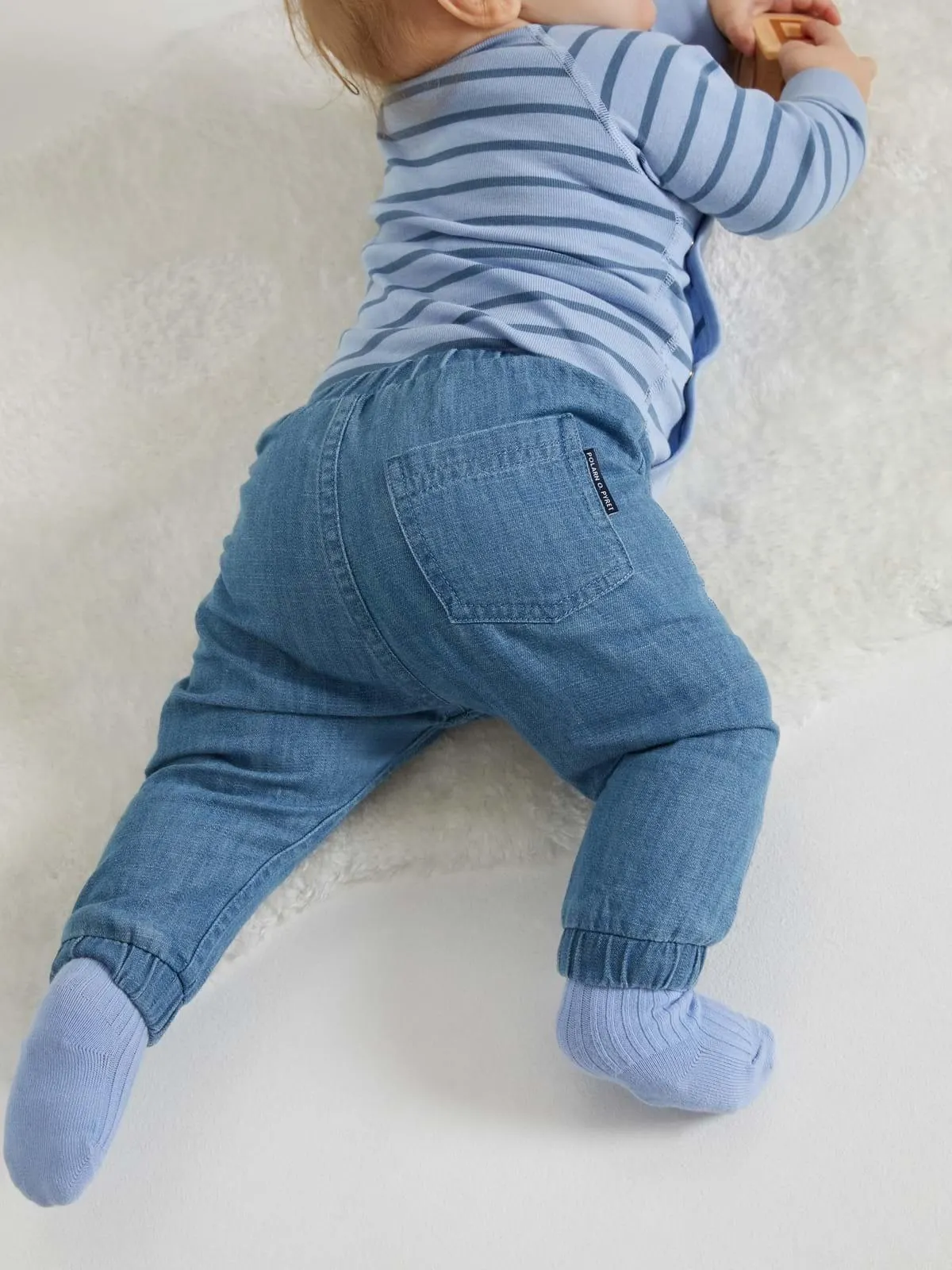 Forlengbar omslagsbody stripet