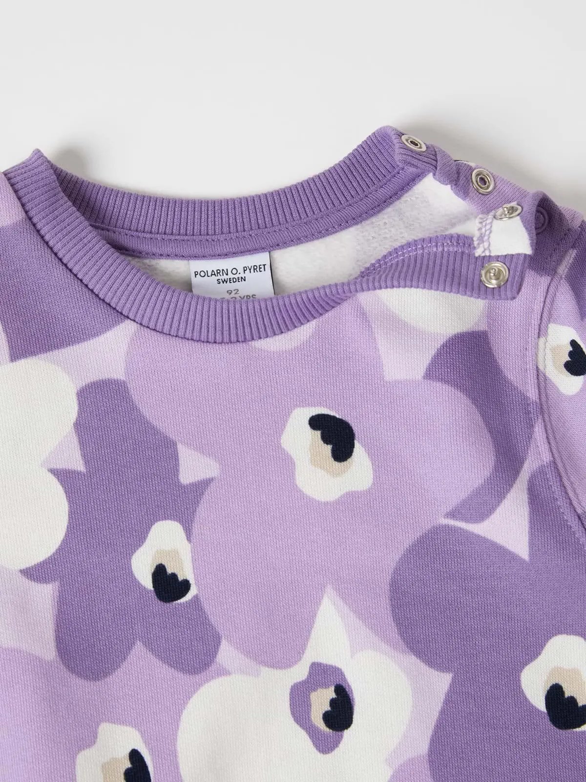 Collegegenser blomstret