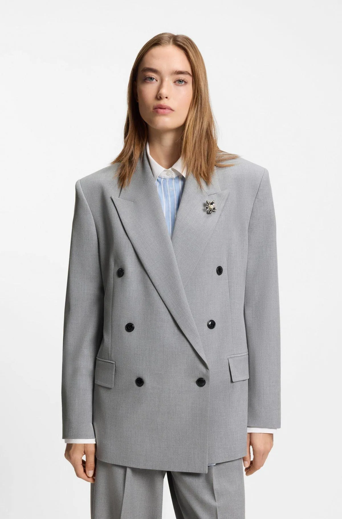 Relaxed-fit blazer with enamel flower brooch