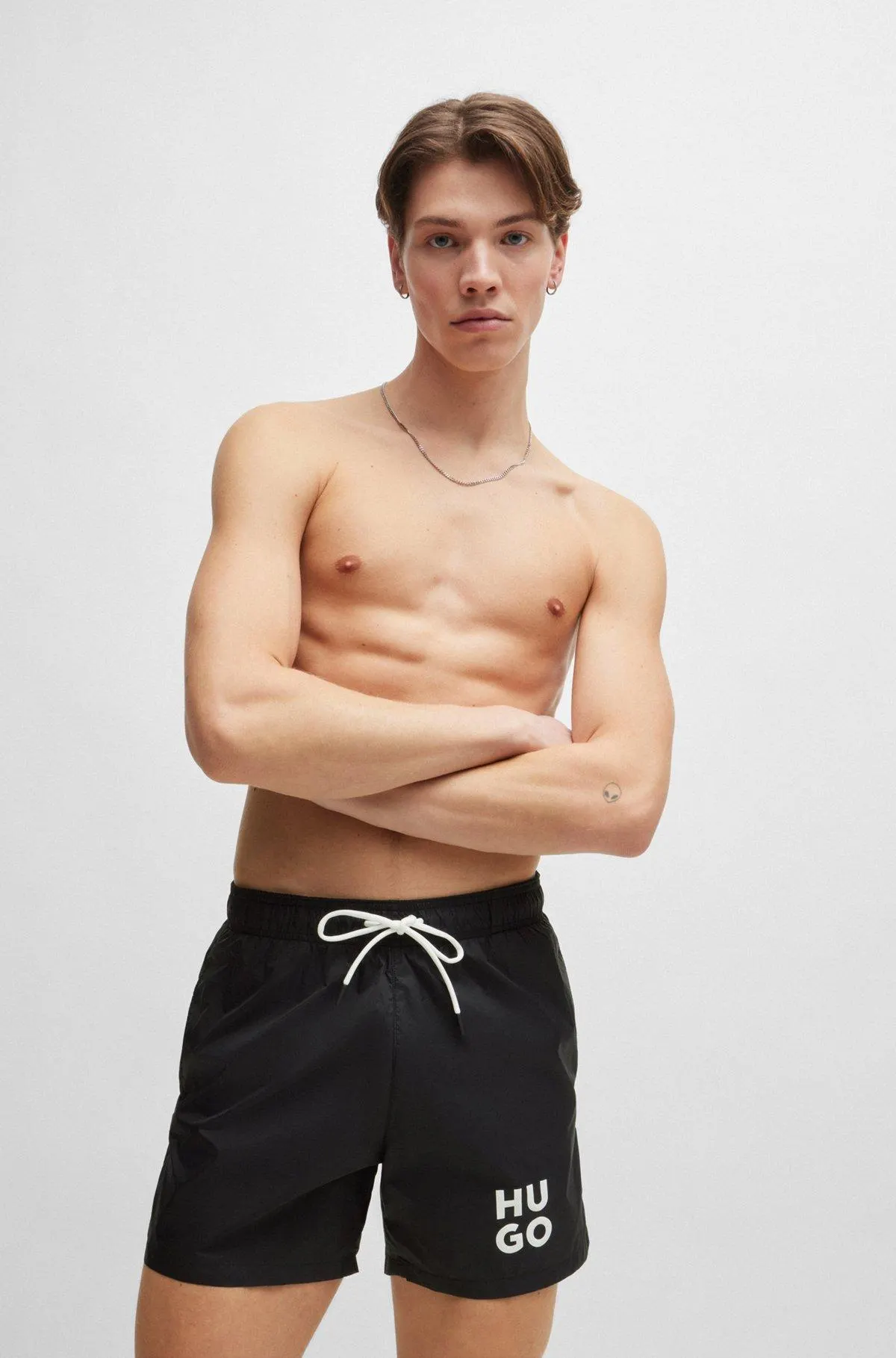 Quick-dry swim shorts with stacked-logo print