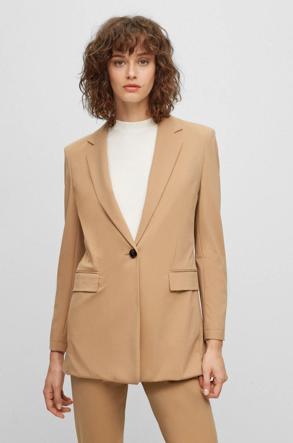 Relaxed-fit long-length jacket in performance-stretch fabric
