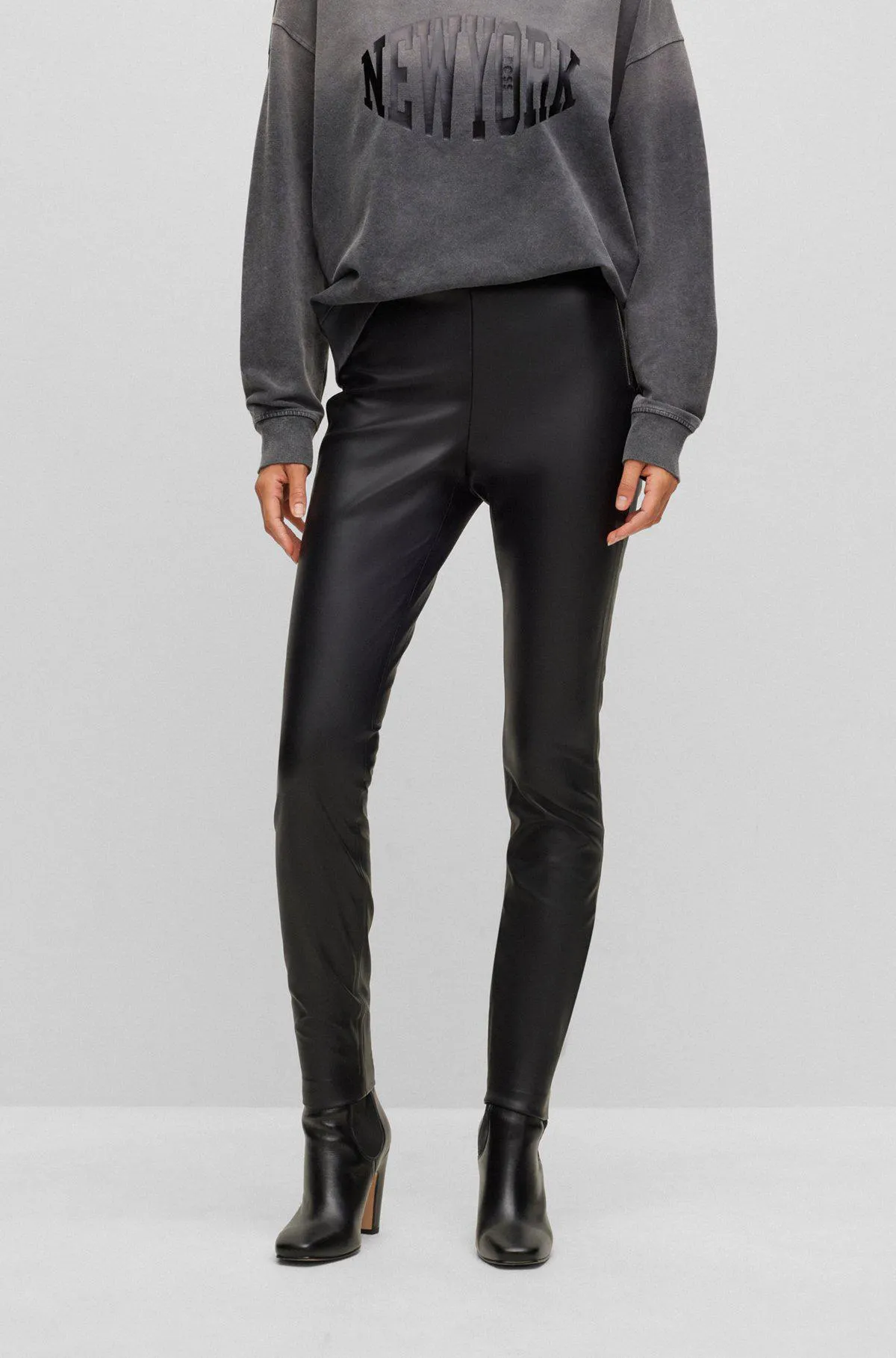 Skinny-fit high-waisted trousers with side zip