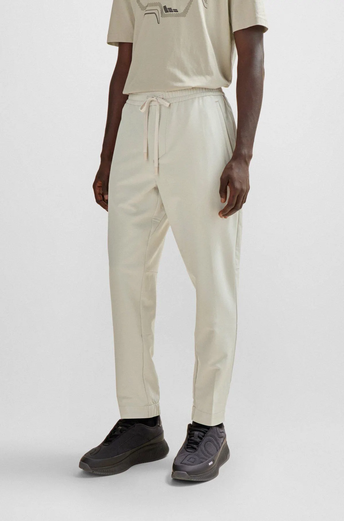 Tapered-fit chinos in easy-iron four-way stretch fabric