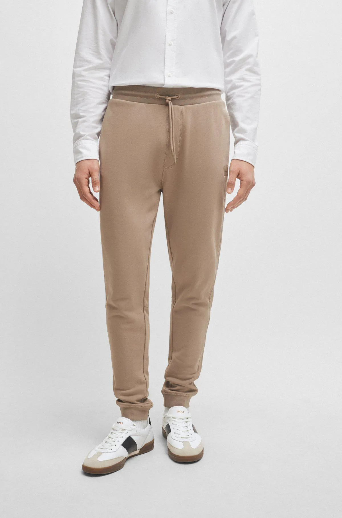 Cotton-terry tracksuit bottoms with logo patch