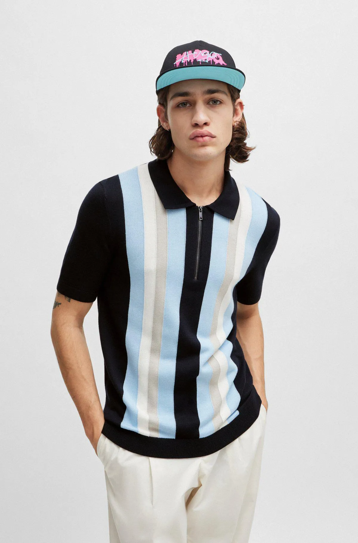Zip-neck polo sweater with vertical stripes