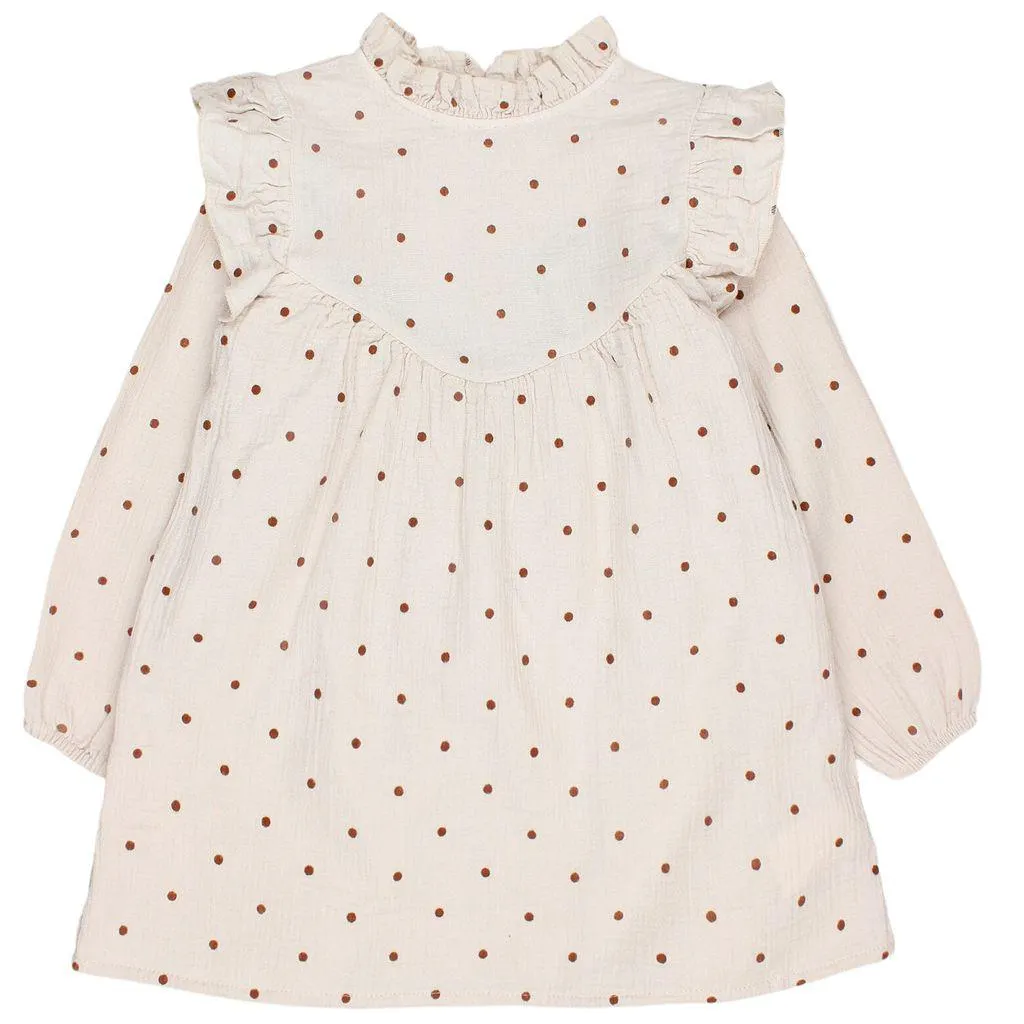 Kjole Med Et Polka Dot-mønster Sand